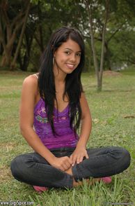 Dainty Clothed Coed Latin Girl In The Park